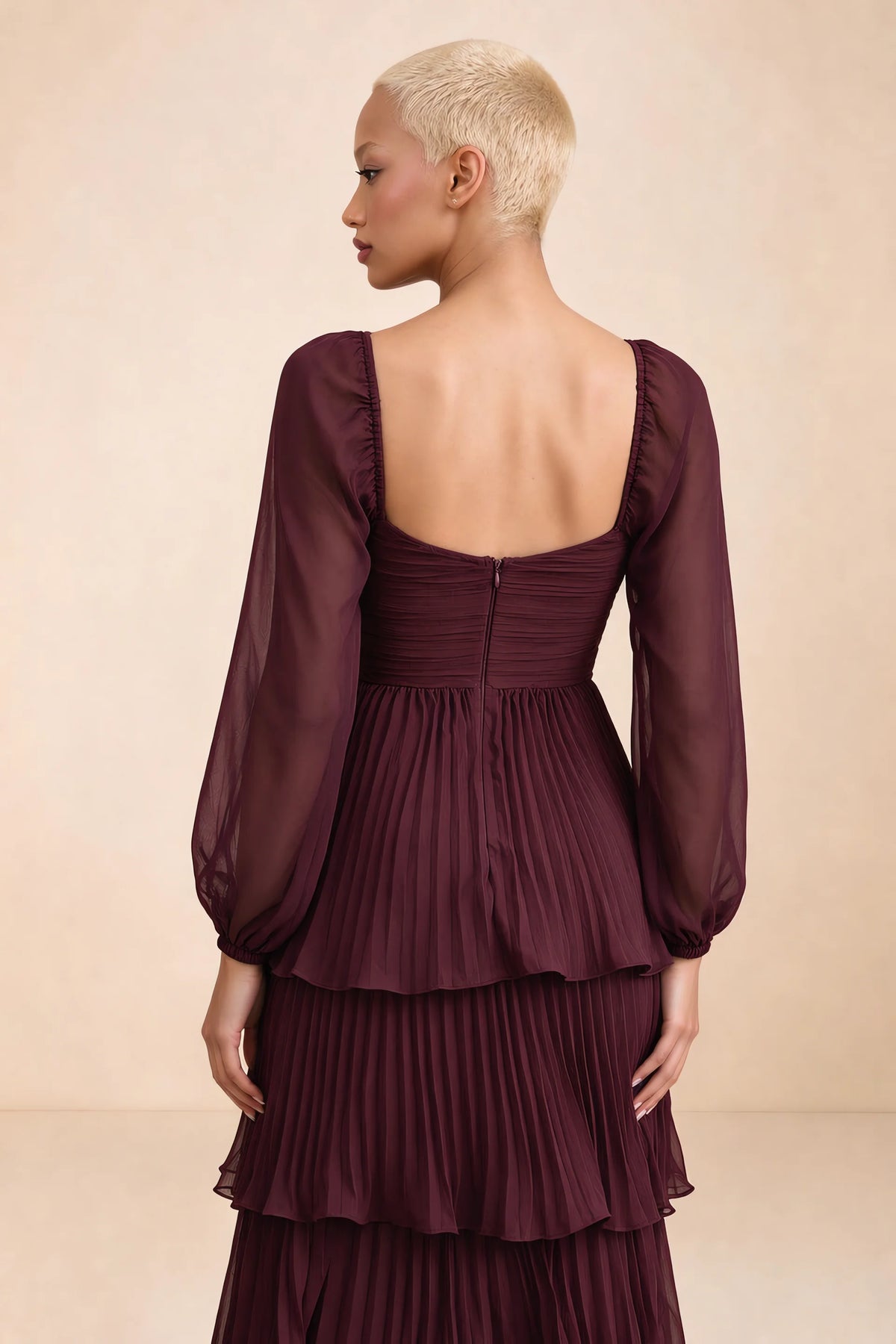 Close-up of low square back, sheer sleeves and centre-back zipper of Sienna wine tiered pleated maxi dress