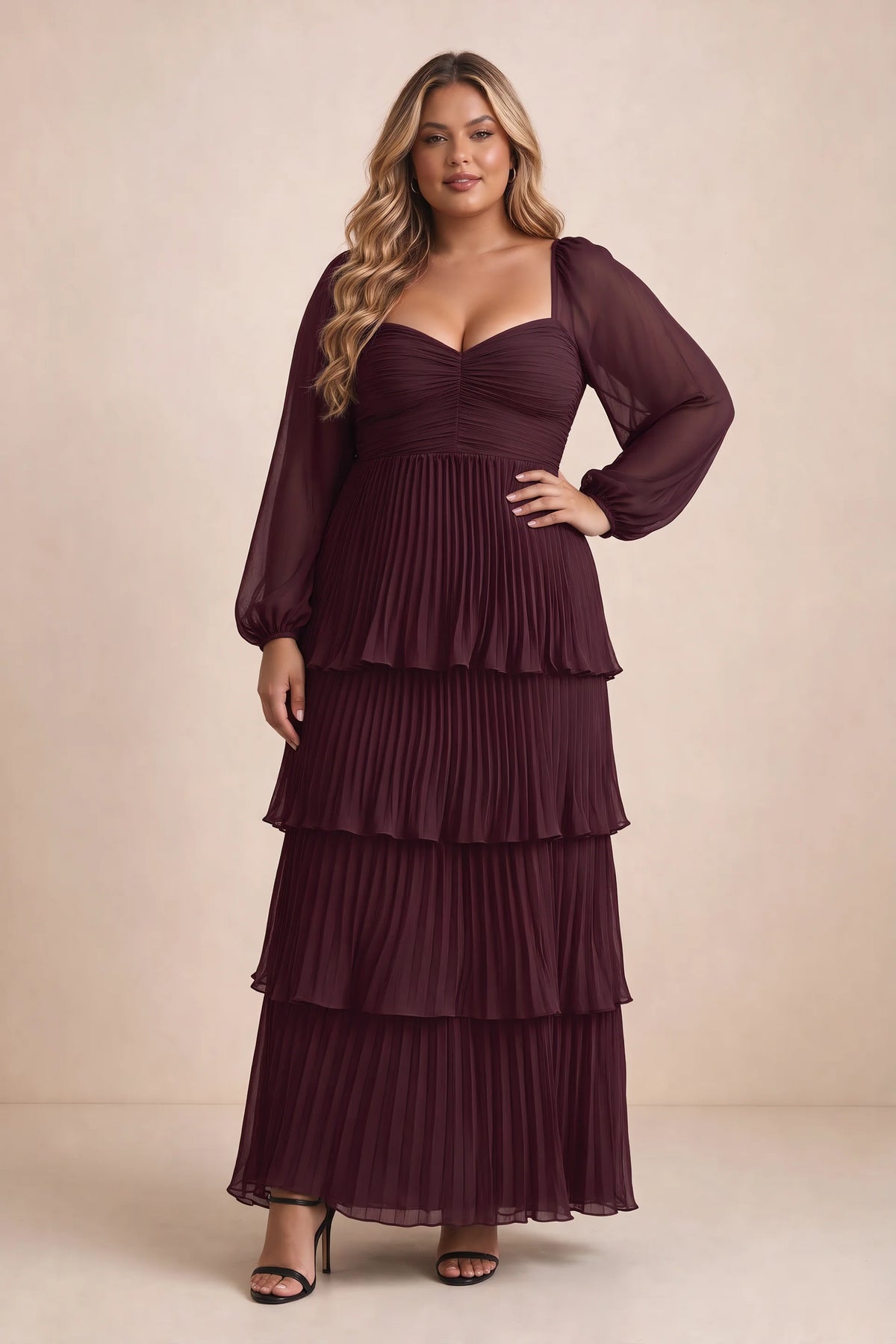 Front view on a second model of Sienna wine tiered pleated maxi dress with a long flowing skirt