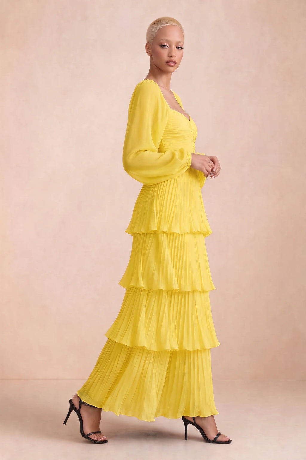Alternate front studio view of Sienna yellow tiered pleated maxi dress with a long flowing skirt