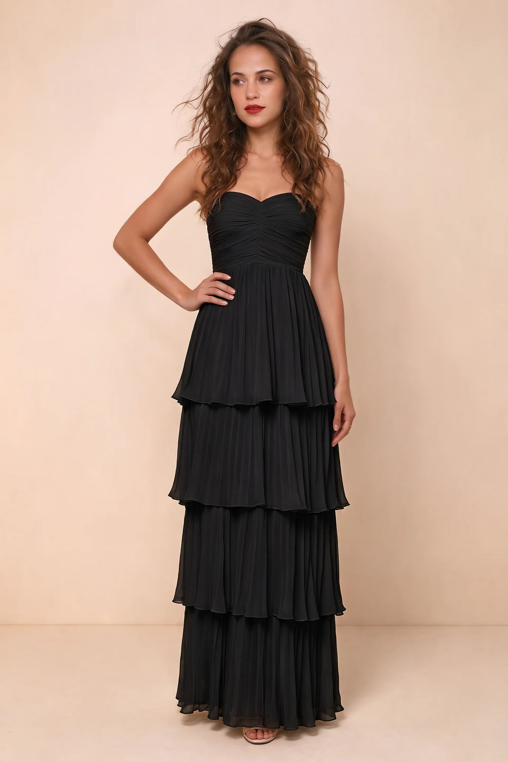 Alternate front studio view of Sonia black tiered pleated maxi dress with a long flowing skirt