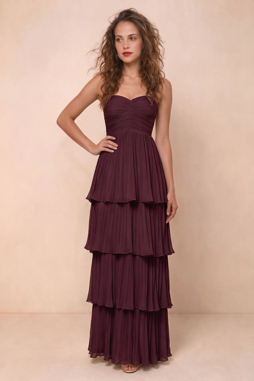 Alternate front studio view of Sonia burgundy tiered pleated maxi dress with a long flowing skirt