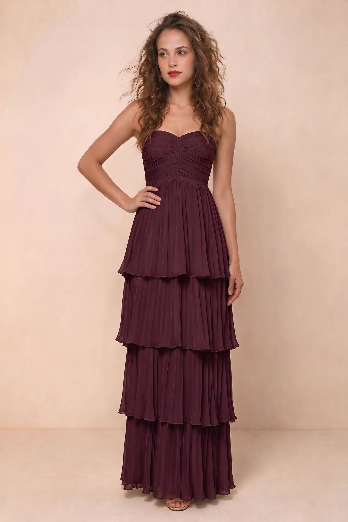 Alternate front studio view of Sonia burgundy tiered pleated maxi dress with a long flowing skirt
