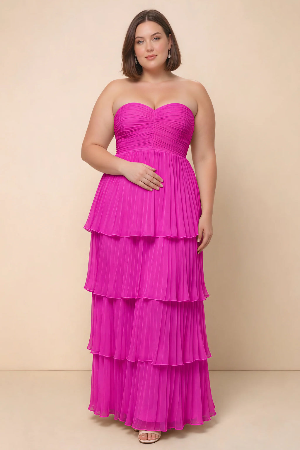 Front view on a second model of Sonia fuchsia tiered pleated maxi dress with a long flowing skirt