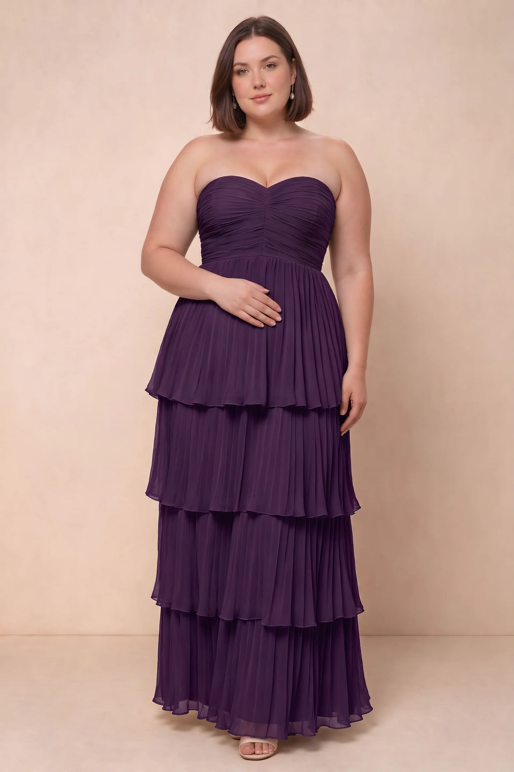 Front view on a second model of Sonia grape tiered pleated maxi dress with a long flowing skirt