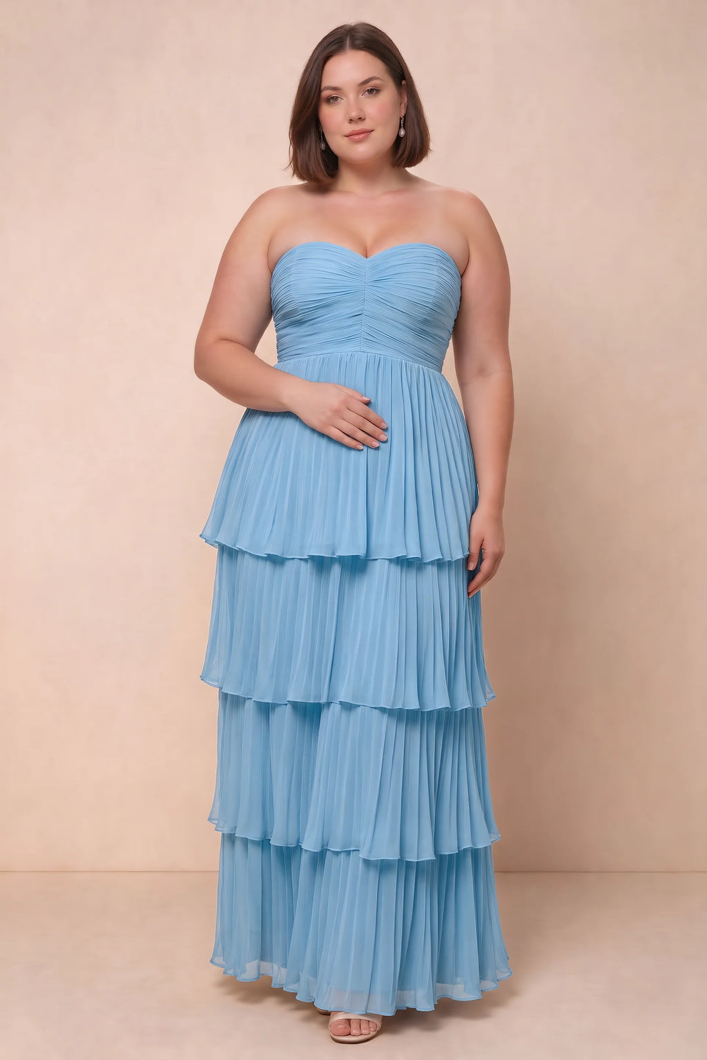 Front view on a second model of Sonia haze blue tiered pleated maxi dress with a long flowing skirt