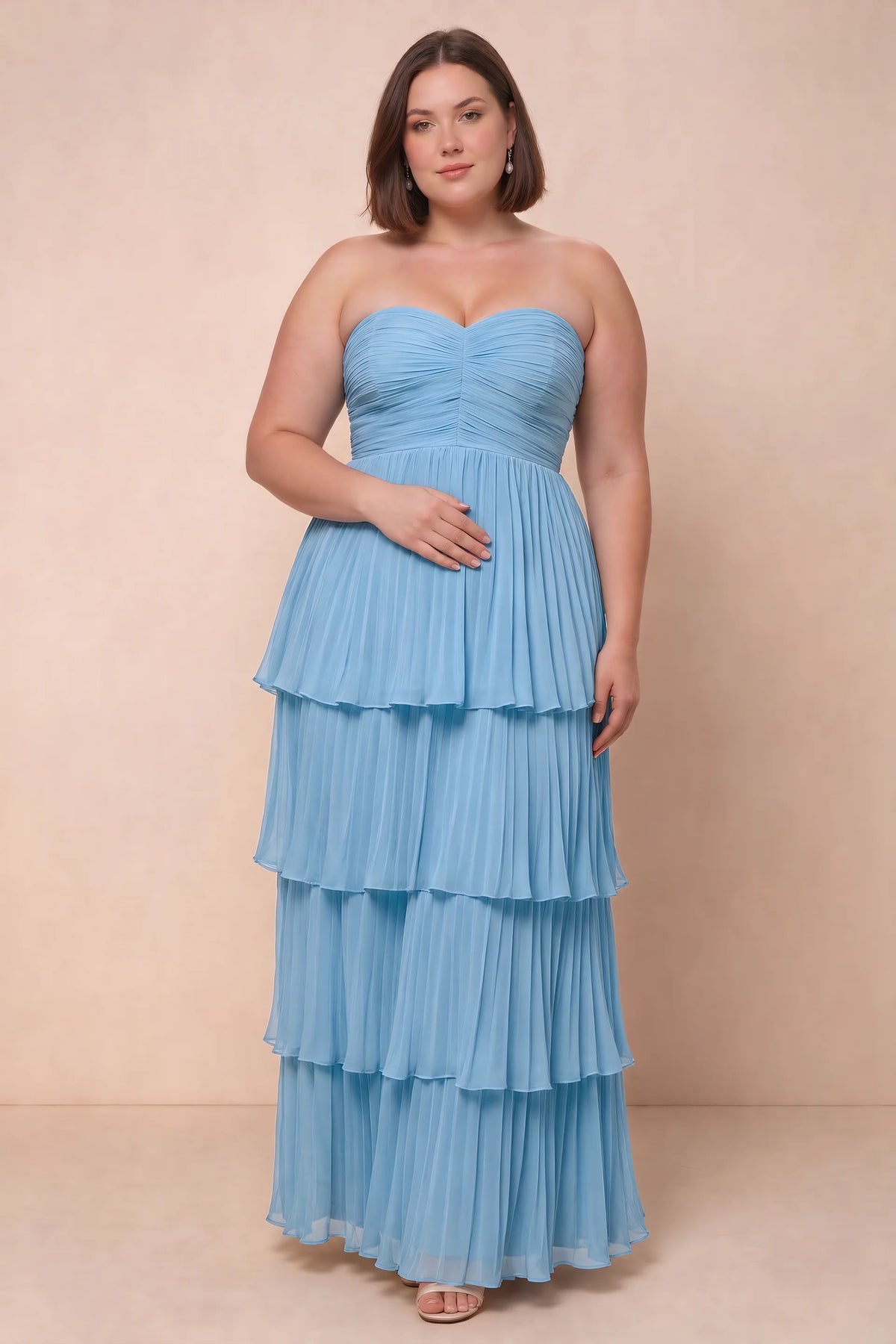 Front view on a second model of Sonia haze blue tiered pleated maxi dress with a long flowing skirt