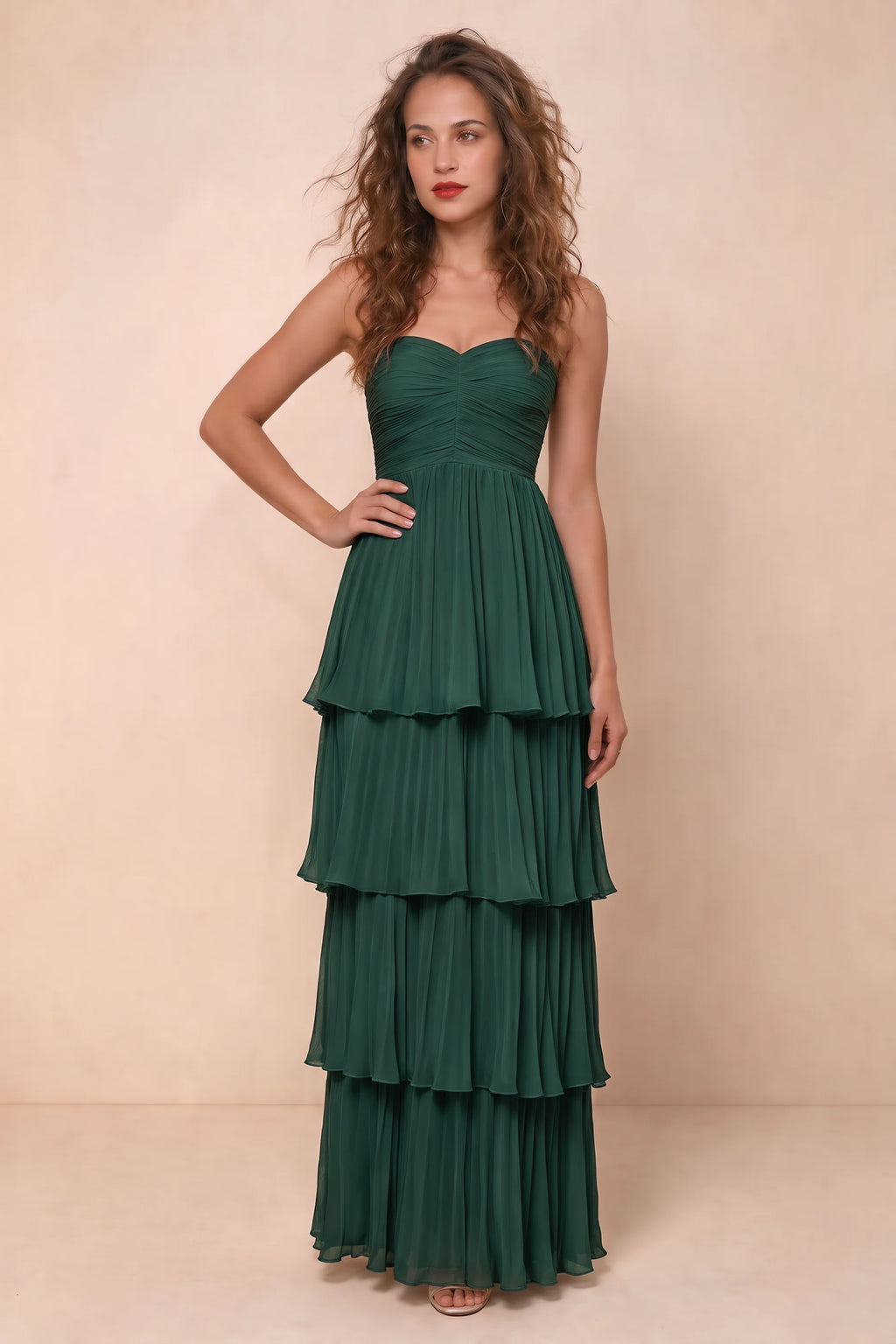Alternate front studio view of Sonia hunter green tiered pleated maxi dress with a long flowing skirt