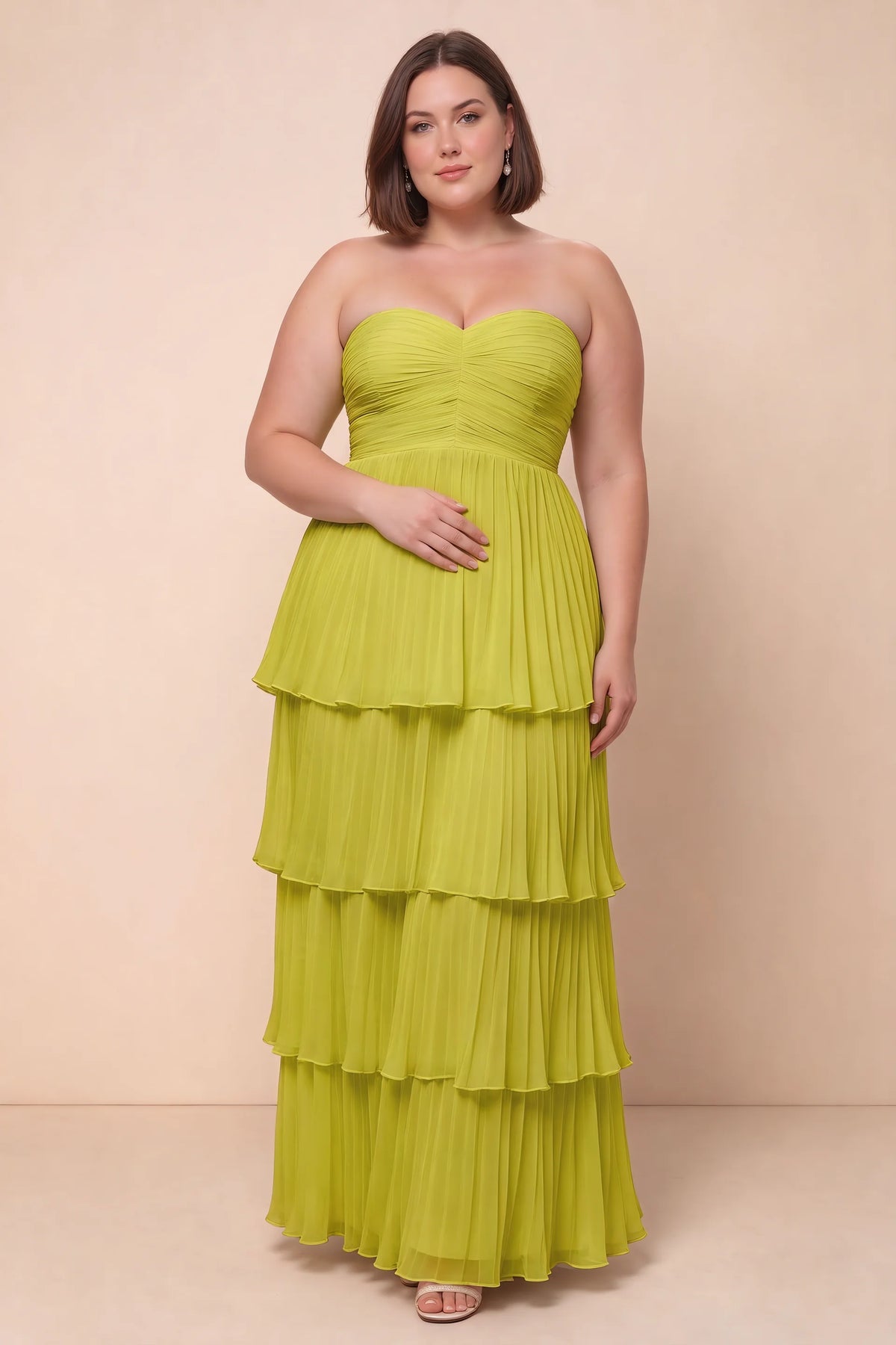 Front view on a second model of Sonia lemon green tiered pleated maxi dress with a long flowing skirt