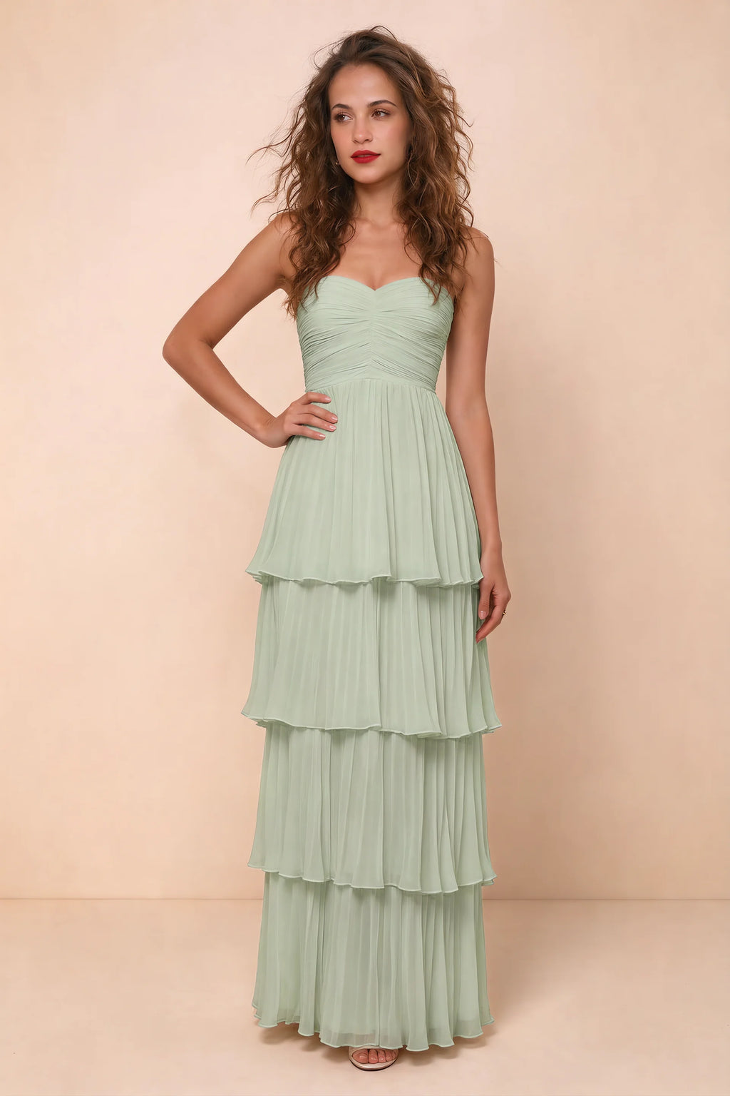 Alternate front studio view of Sonia light green tiered pleated maxi dress with a long flowing skirt