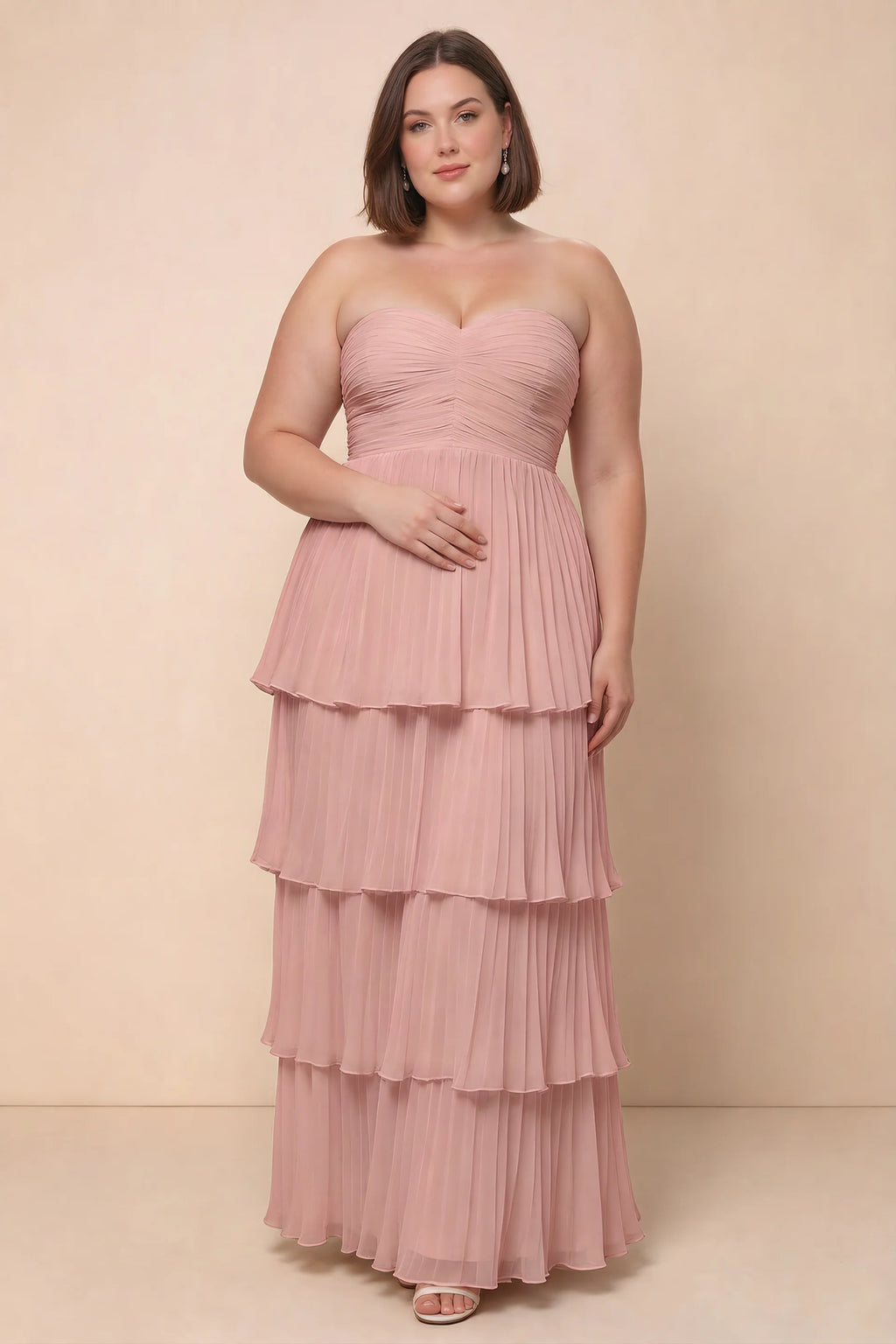 Front view on a second model of Sonia light pink tiered pleated maxi dress with a long flowing skirt