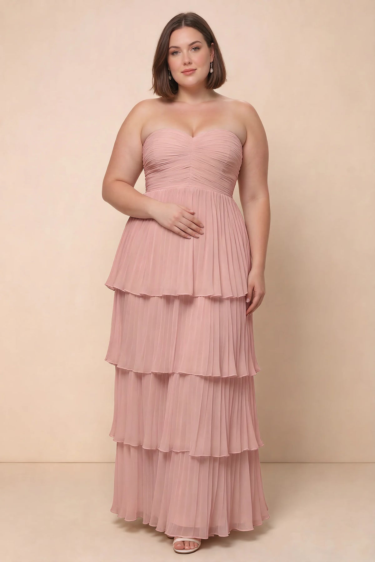 Front view on a second model of Sonia light pink tiered pleated maxi dress with a long flowing skirt