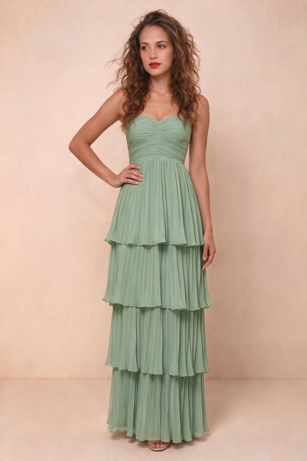Alternate front studio view of Sonia matcha green tiered pleated maxi dress with a long flowing skirt