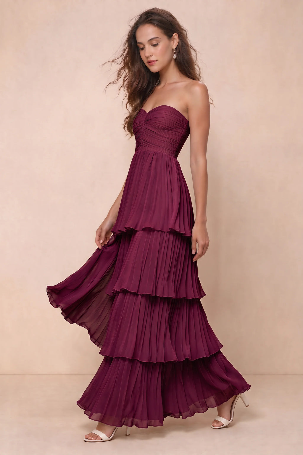 Front studio view of Sonia merlot tiered pleated maxi dress with a long flowing skirt