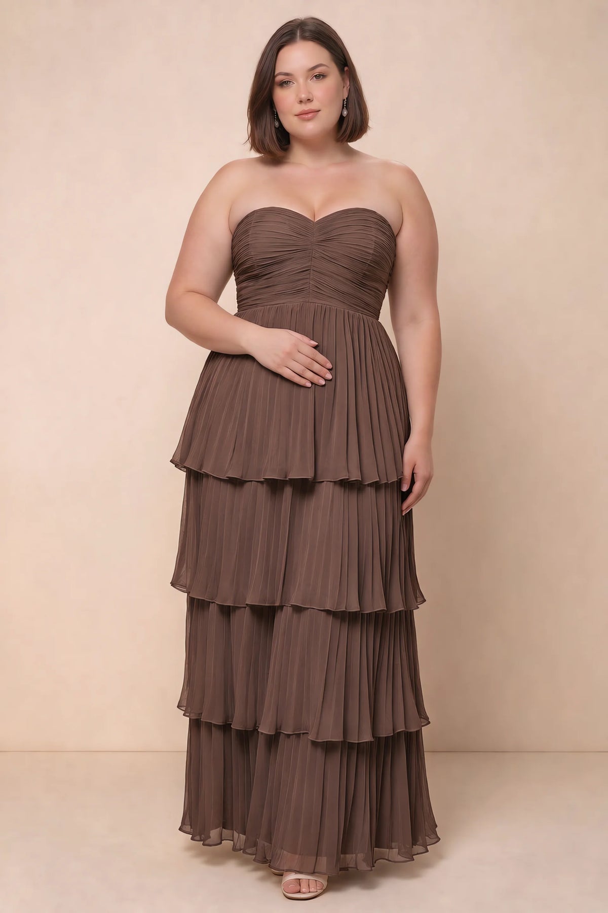 Front view on a second model of Sonia mocha tiered pleated maxi dress with a long flowing skirt