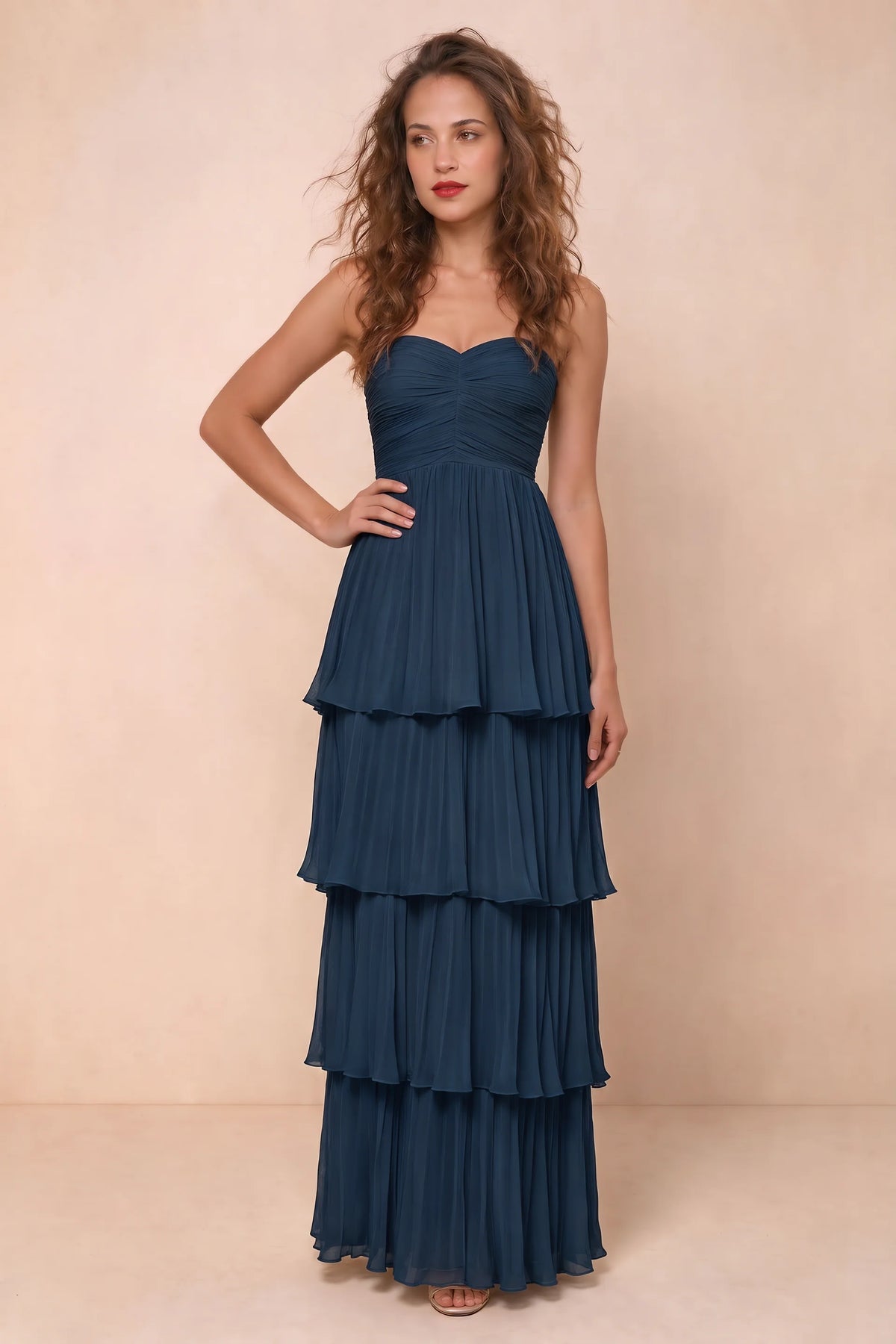 Alternate front studio view of Sonia navy tiered pleated maxi dress with a long flowing skirt
