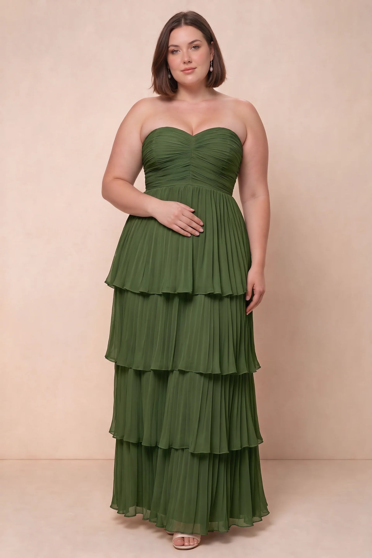 Front view on a second model of Sonia olive green tiered pleated maxi dress with a long flowing skirt
