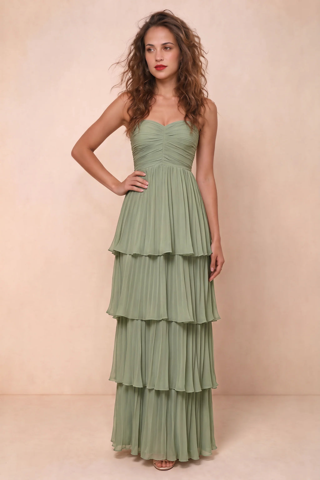 Alternate front studio view of Sonia pistachio tiered pleated maxi dress with a long flowing skirt