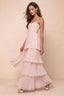 Front studio view of Sonia powder pink tiered pleated maxi dress with a long flowing skirt