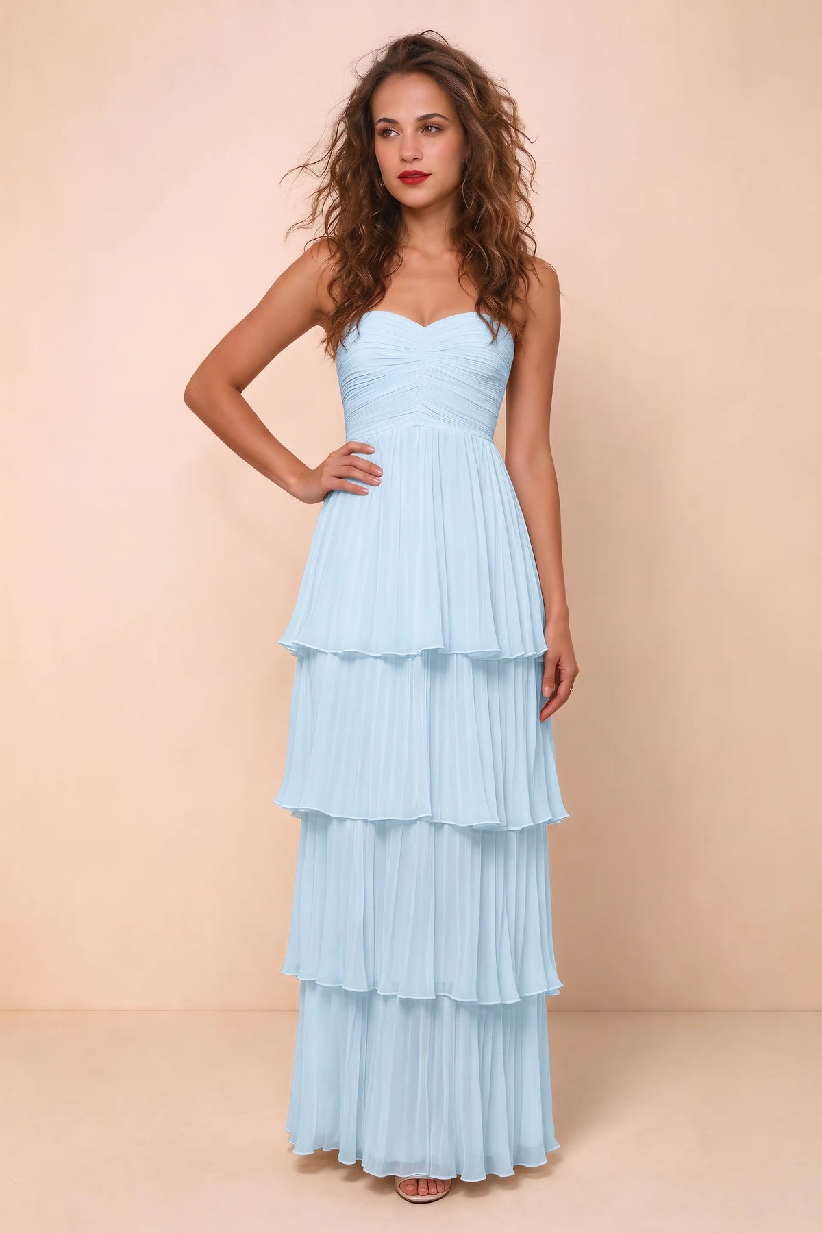 Alternate front studio view of Sonia sky blue tiered pleated maxi dress with a long flowing skirt