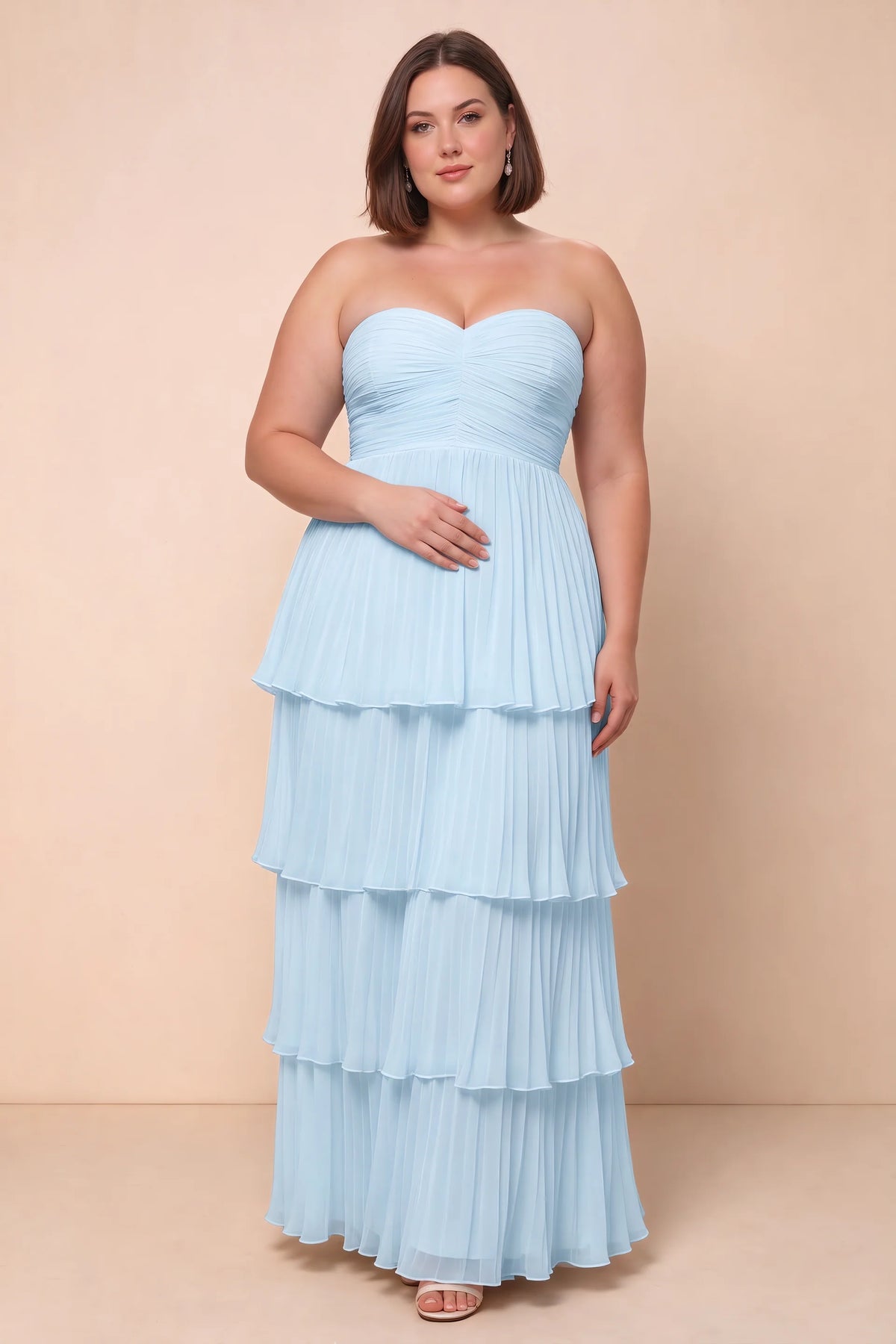 Front view on a second model of Sonia sky blue tiered pleated maxi dress with a long flowing skirt