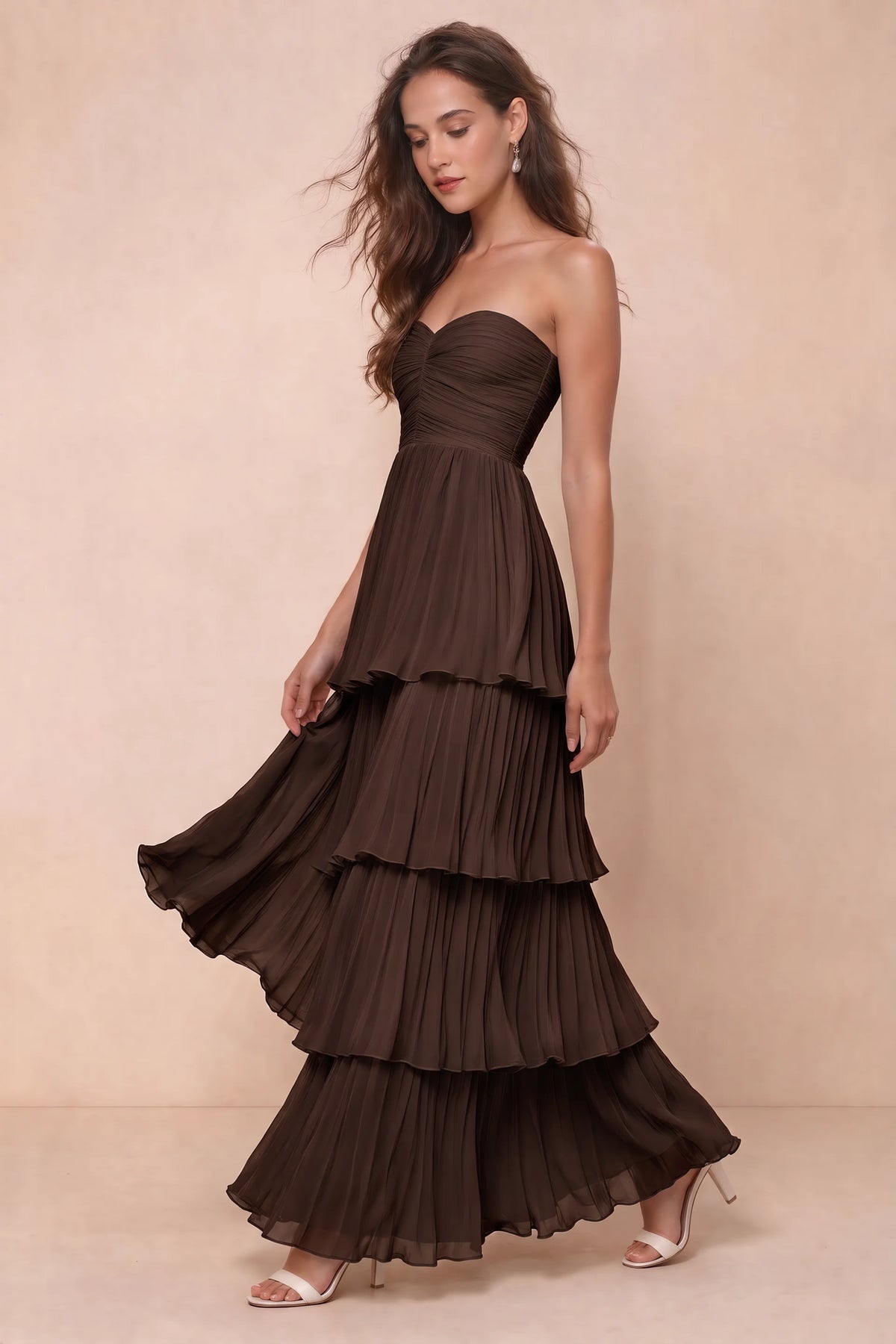 Front studio view of Sonia truffle tiered pleated maxi dress with a long flowing skirt