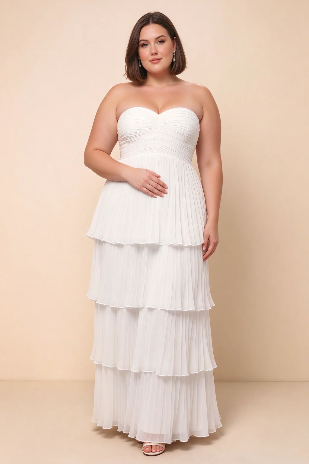 Front view on a second model of Sonia white tiered pleated maxi dress with a long flowing skirt