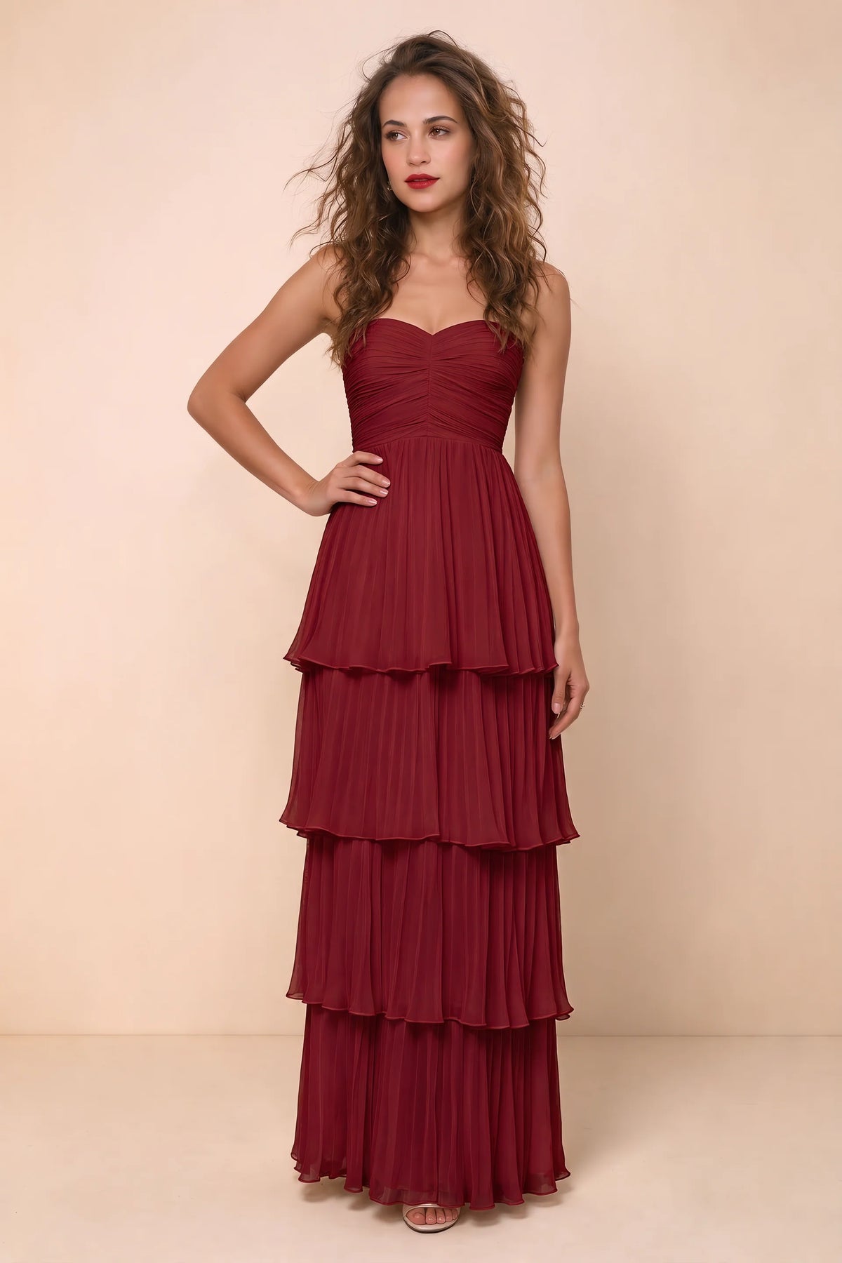 Alternate front studio view of Sonia wine tiered pleated maxi dress with a long flowing skirt
