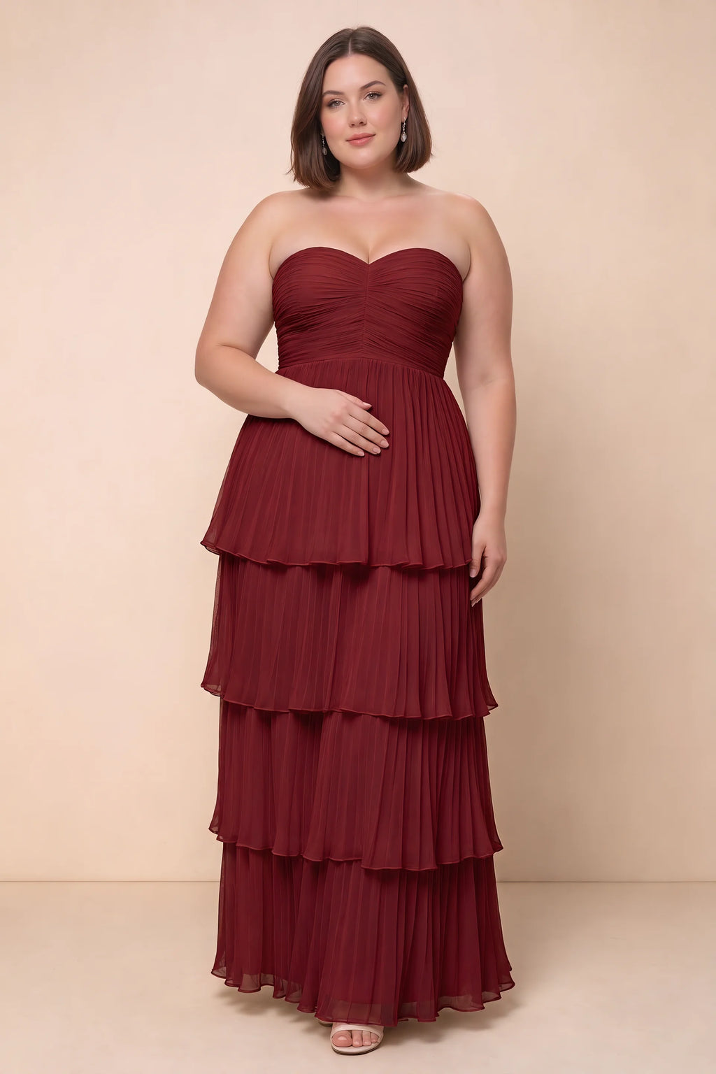 Front view on a second model of Sonia wine tiered pleated maxi dress with a long flowing skirt