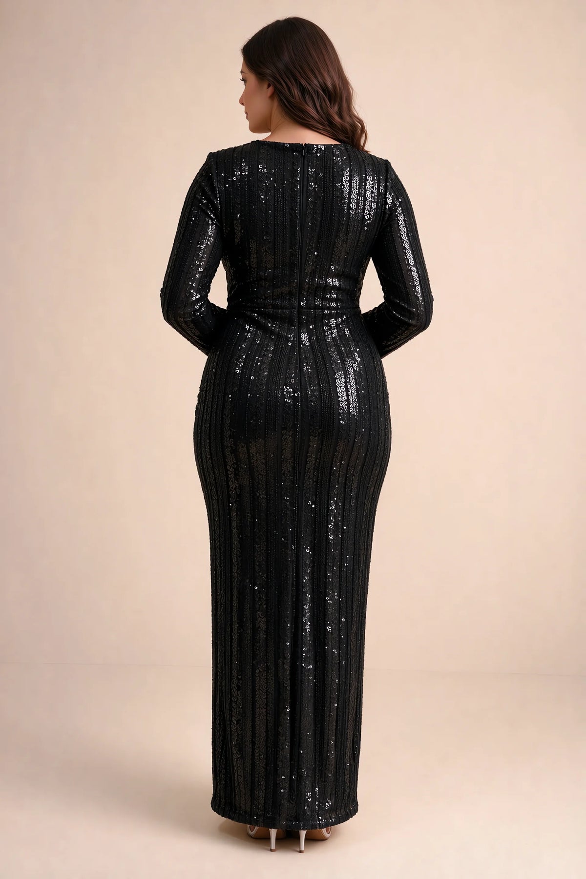 Rear view on a second model of Valeria black long sleeve V-neck slit maxi dress with a long straight skirt