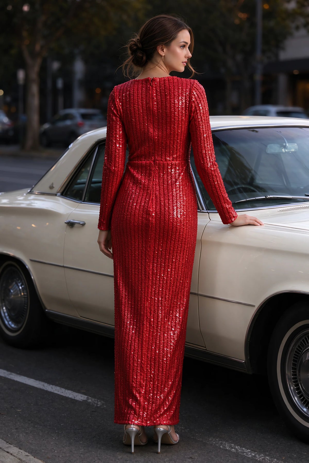 Outdoor rear view beside a classic car of Valeria red long sleeve V-neck slit maxi dress with a long straight skirt