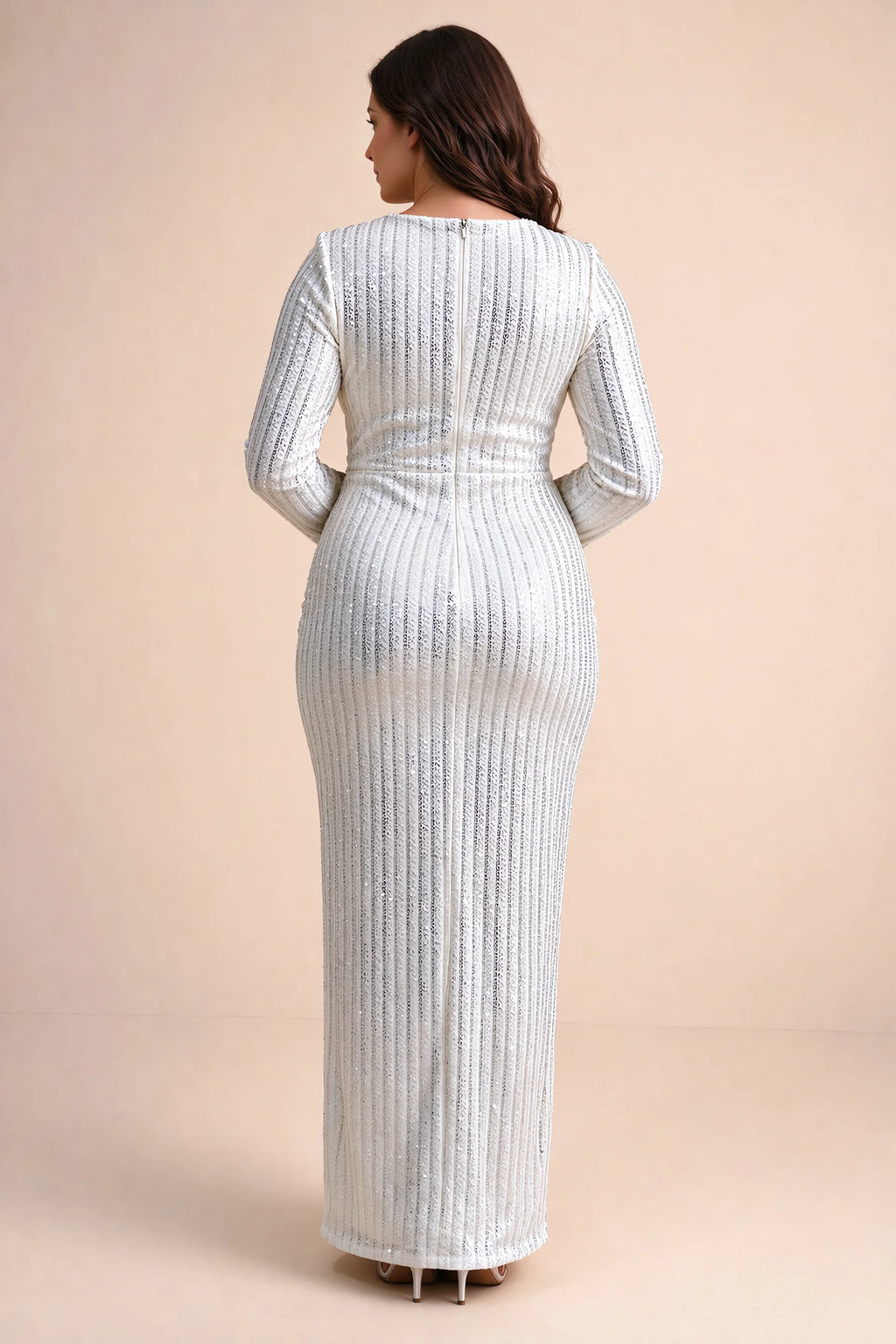 Rear view on a second model of Valeria silver long sleeve V-neck slit maxi dress with a long straight skirt