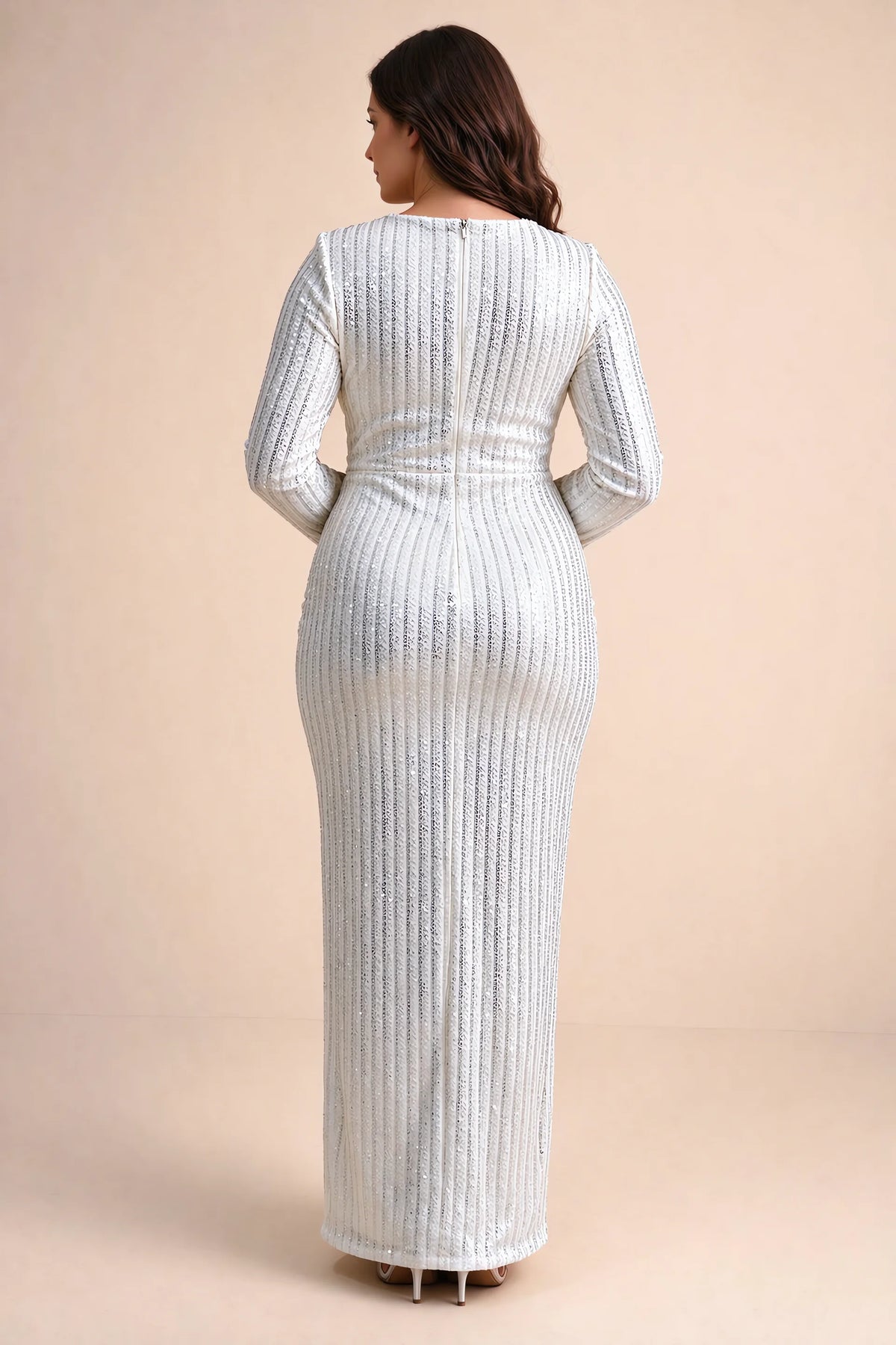 Rear view on a second model of Valeria silver long sleeve V-neck slit maxi dress with a long straight skirt